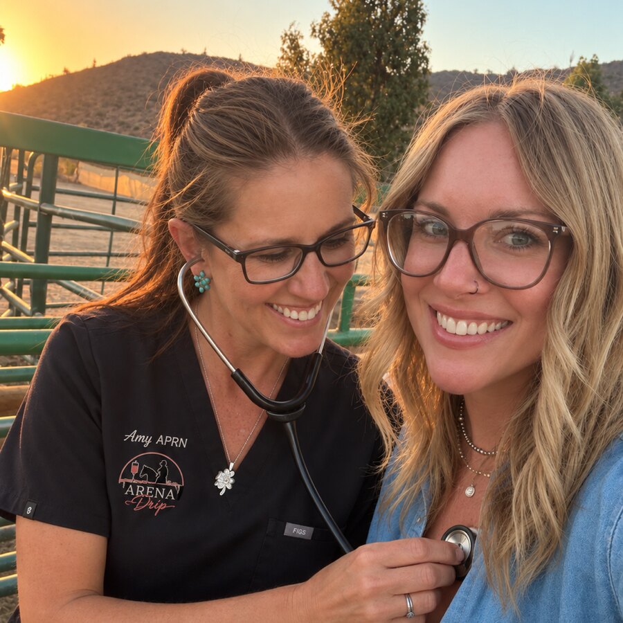 ARENA Drip nurse practitioner Amy Pallesen listening to a client's heart with a stethoscope at the corral at sunset